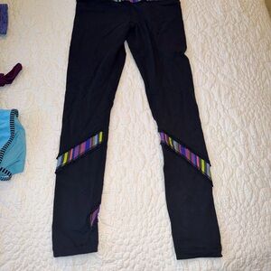 Black lululemon Leggings with Striped/ ruffles accents…size 2